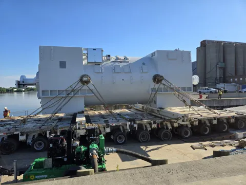 Heavy lift on SPMT using RO/RO with Hudson River and Ardent Mills in the background