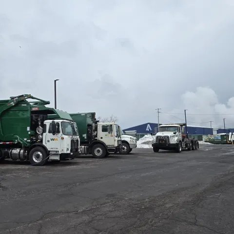 WM trucks with Port warehouse in the background