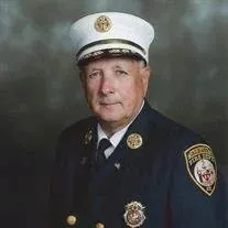In memory of Warren Abriel - formal photo of older gentleman in Albany Fire Department uniform 
