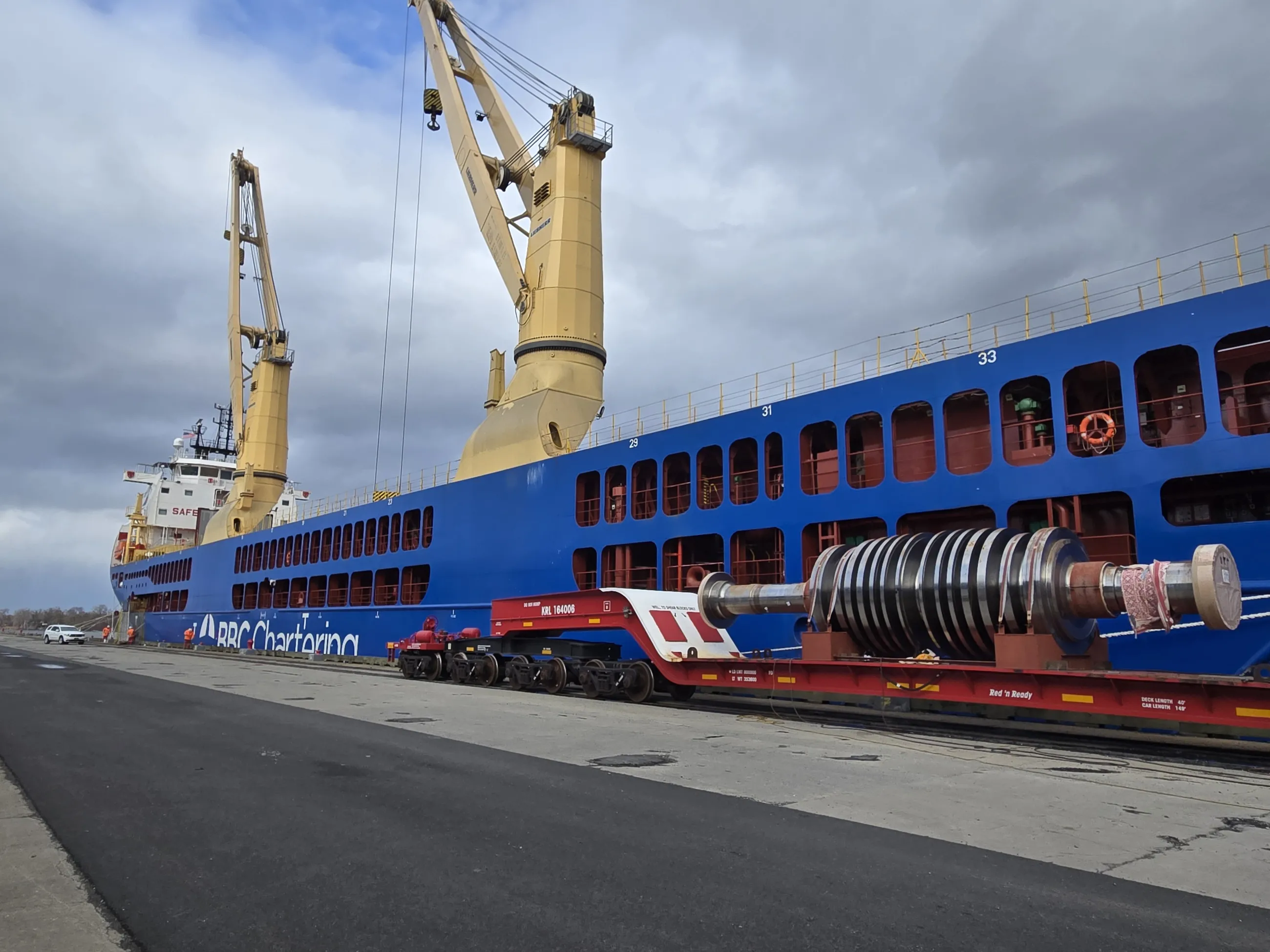 BBC at dock with GE cargo on heavy transport trailer