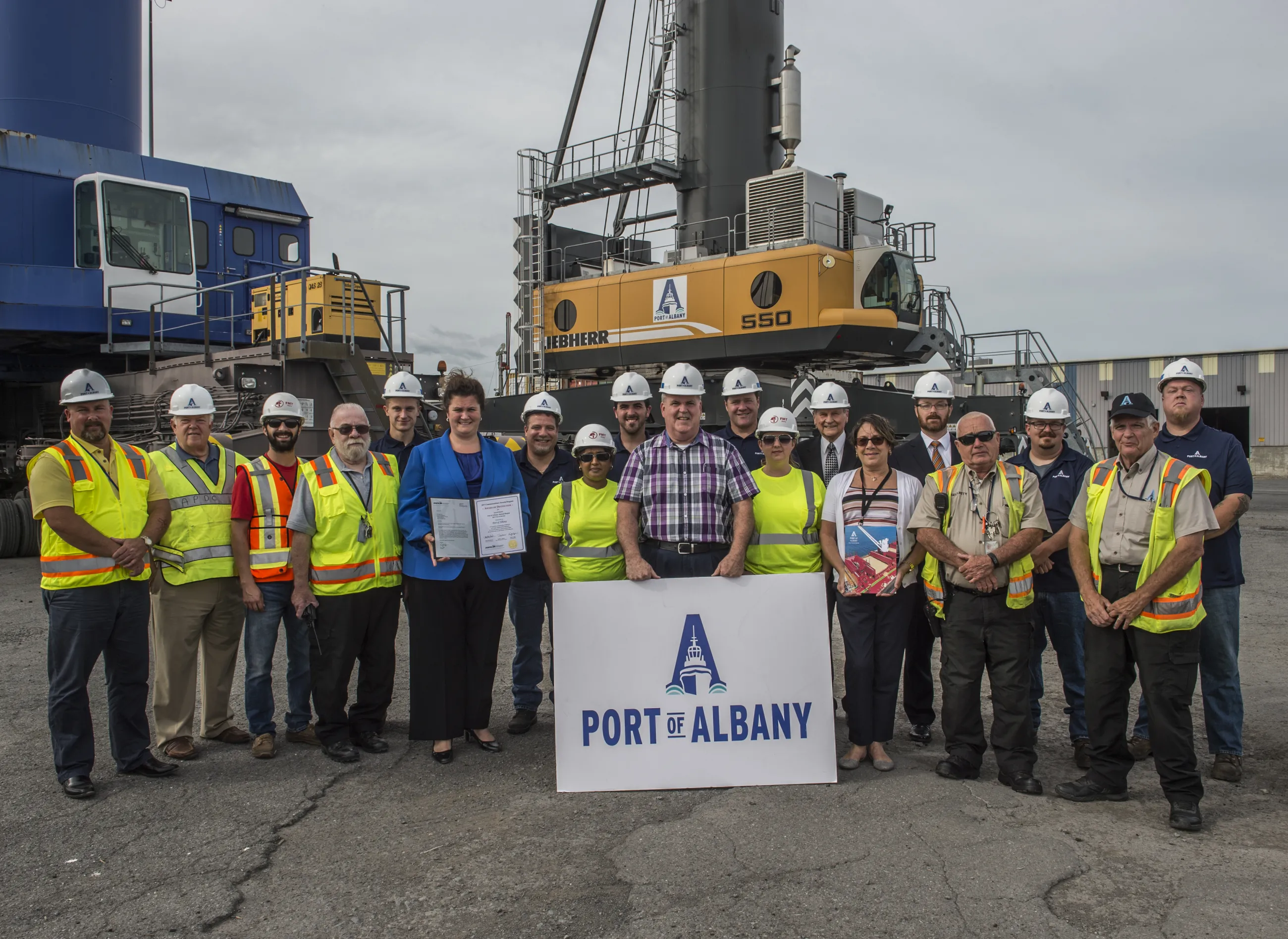 Staff with recognition for South Dock construction recognition
