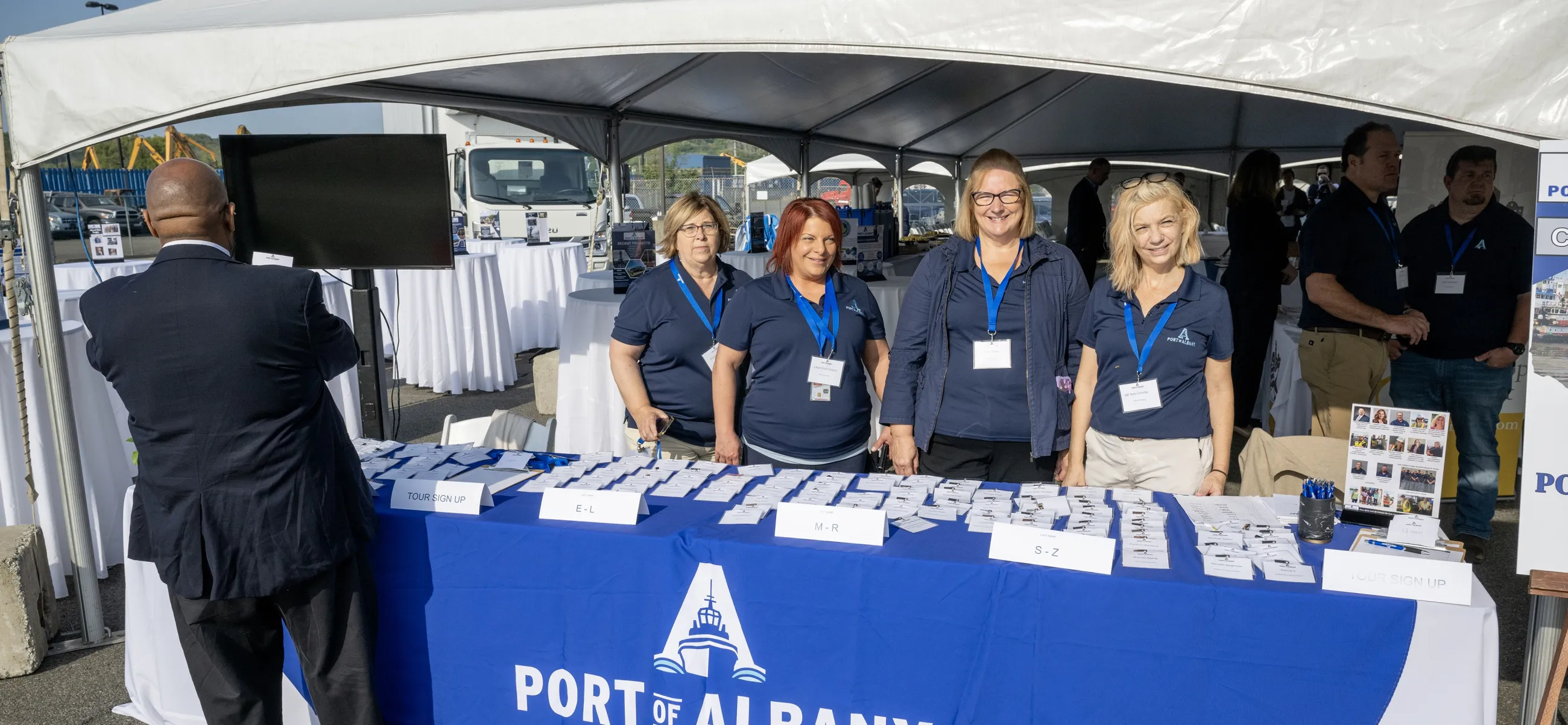 Port staff at welcome registration table at Port Industry Day 2024